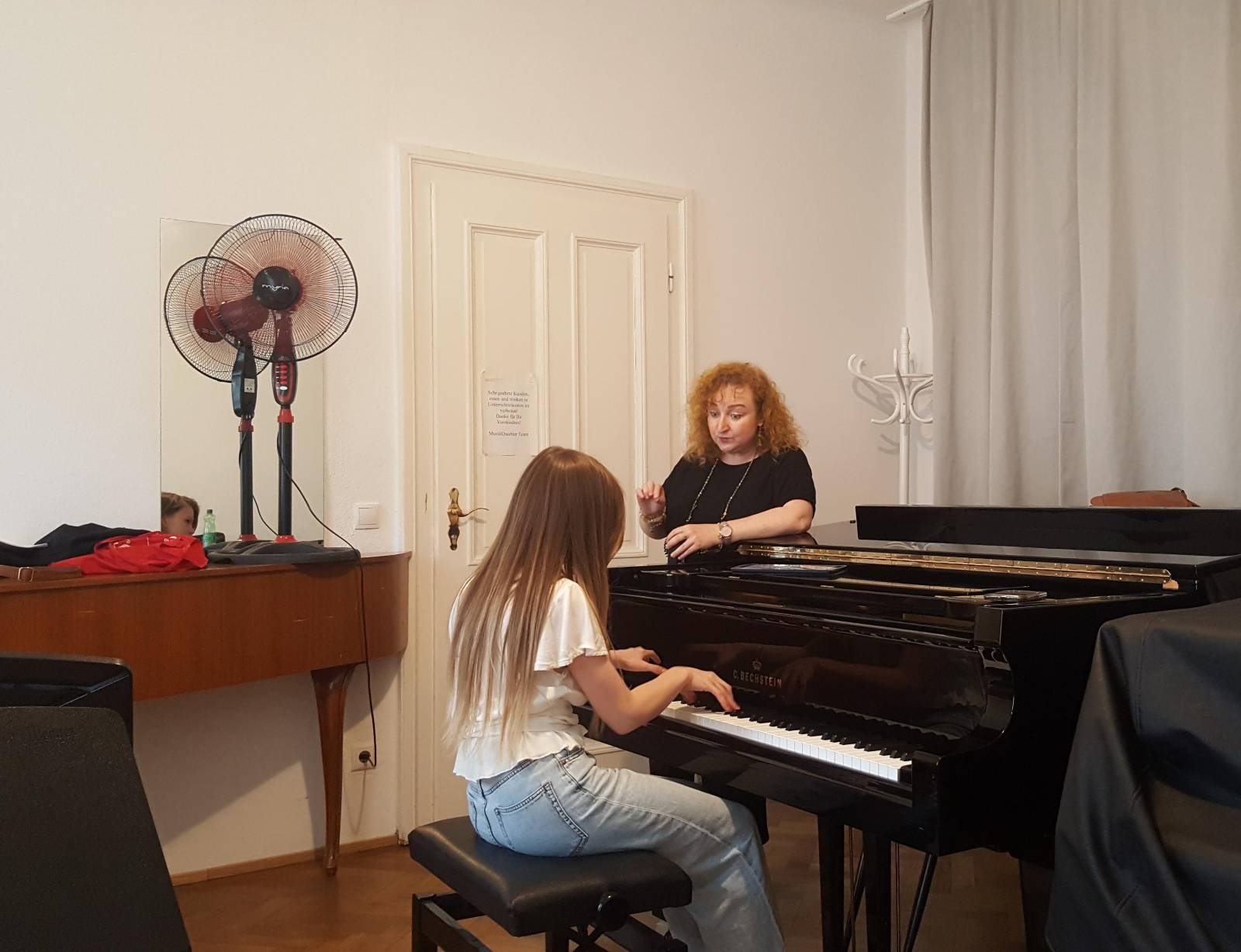 Tamara Atschba teaching at the piano